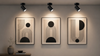 360° adjustable GY ceiling spotlight providing focused LED lighting on wall artwork in a modern interior